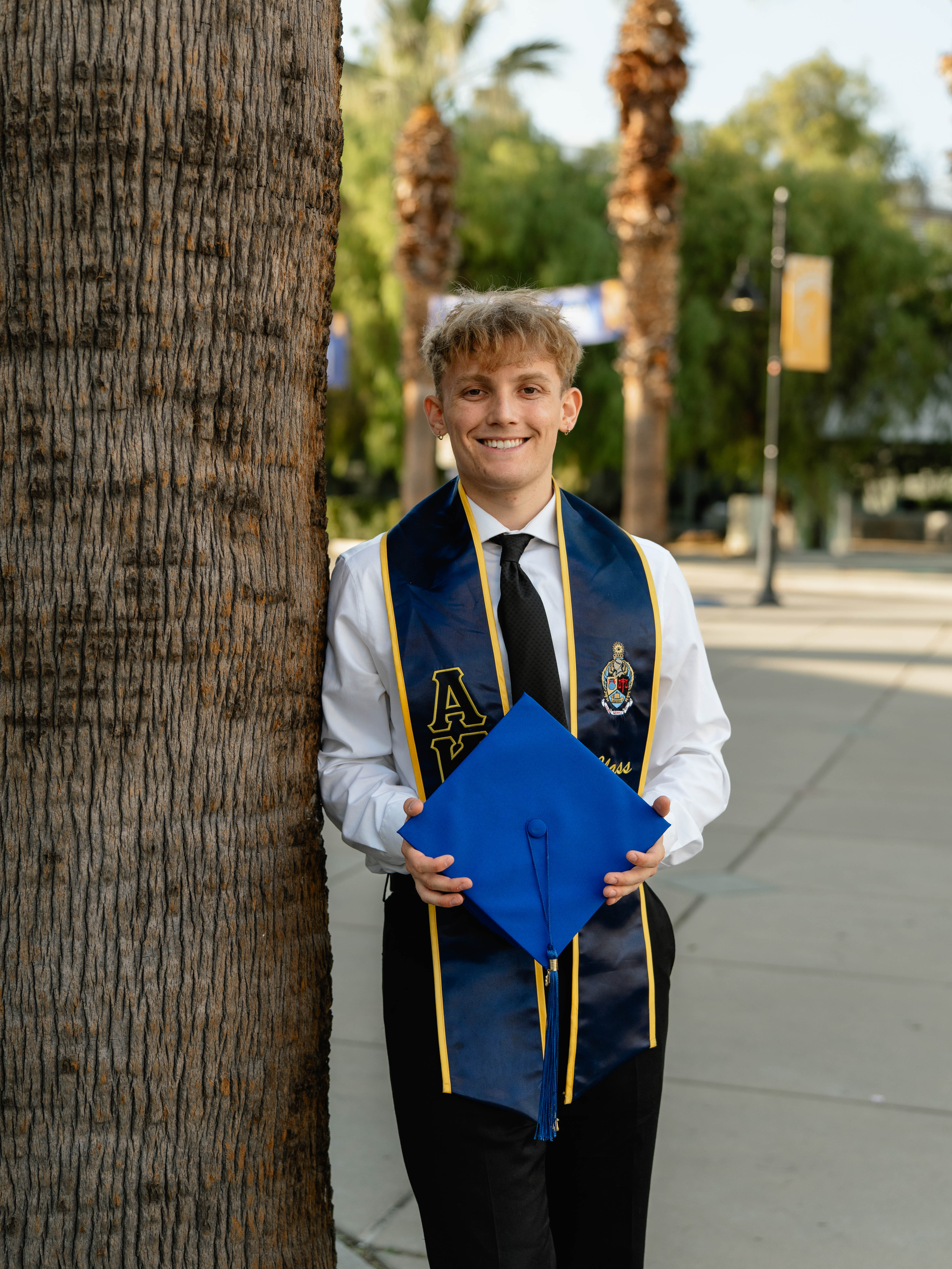 SJSU graduate portrait session near a campus building